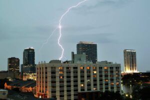 lightning strikes downtown orlando florida, one of the stormiest cities in the US.