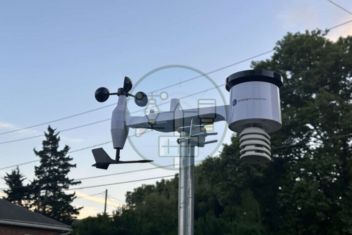 WS-1965-side-closeup Outdoor weather station equipment against blue sky